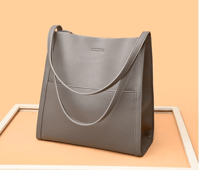 Noemi™ | Borsa a Spalla a Tinta Unita